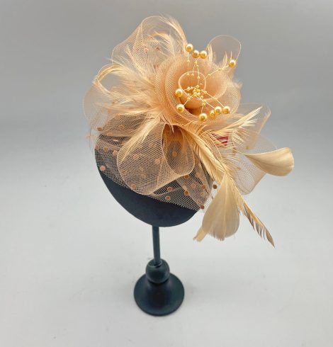 A photo of the Serena Fascinator in Light Brown product