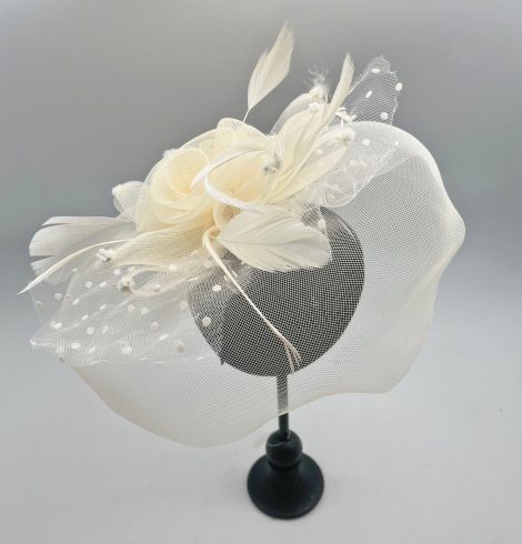 A photo of the Flora Fascinator in Cream product