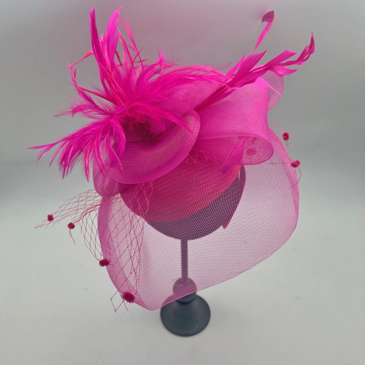 A photo of the Feather Fascinator in Neon Pink product