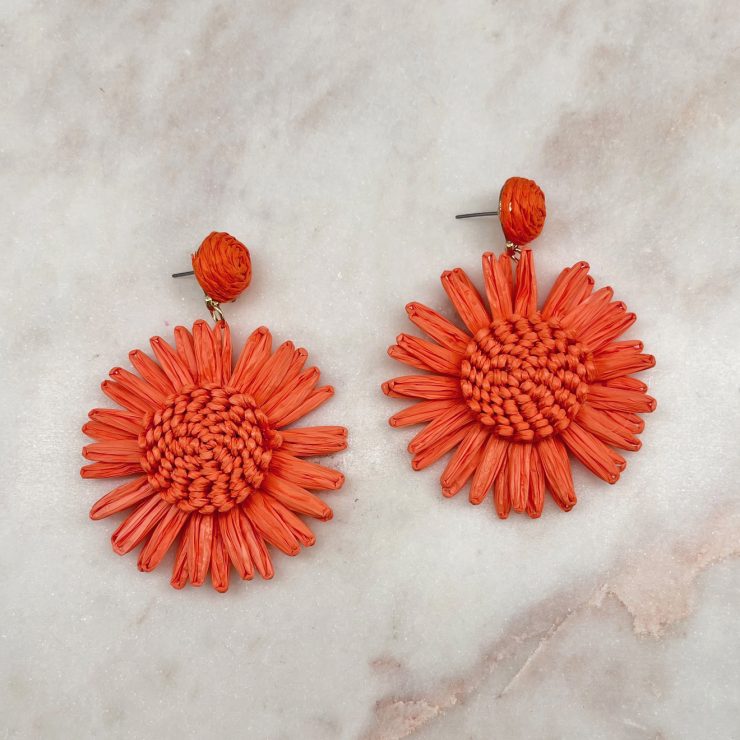 A photo of the Naya Earrings in Orange product