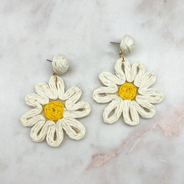 A photo of the Daisy Earrings in White product