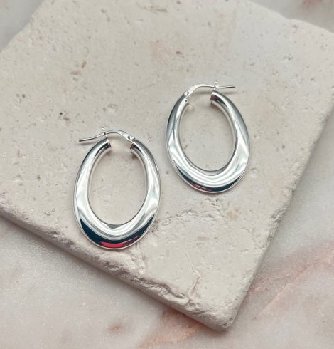 A photo of the Italian Sterling Silver Small Flat Oval Hoops product