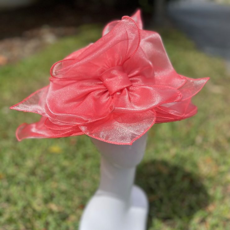 A photo of the Vera Fascinator Hat in Coral product