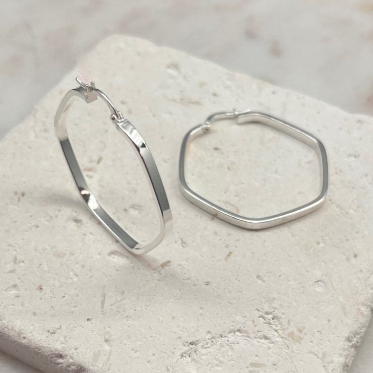 A photo of the Italian Sterling Silver Hexagon Flat Hoops product