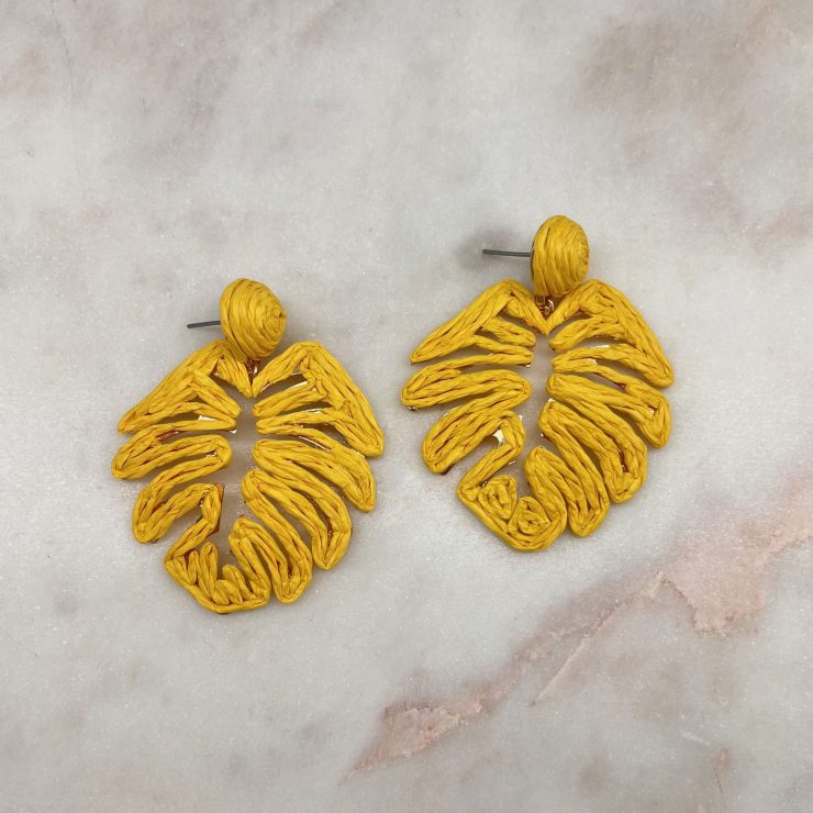 A photo of the Tropical Leaf Earrings in Yellow product