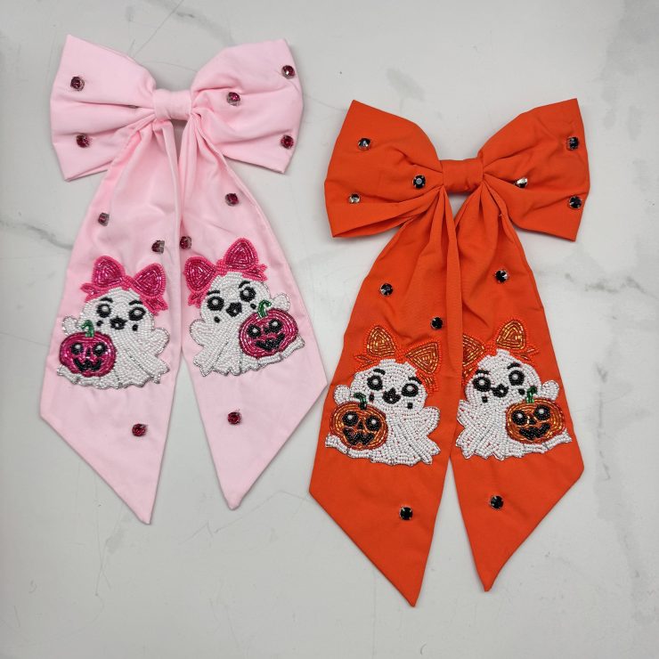A photo of the Ghost with Pumpkin Hair Bow product